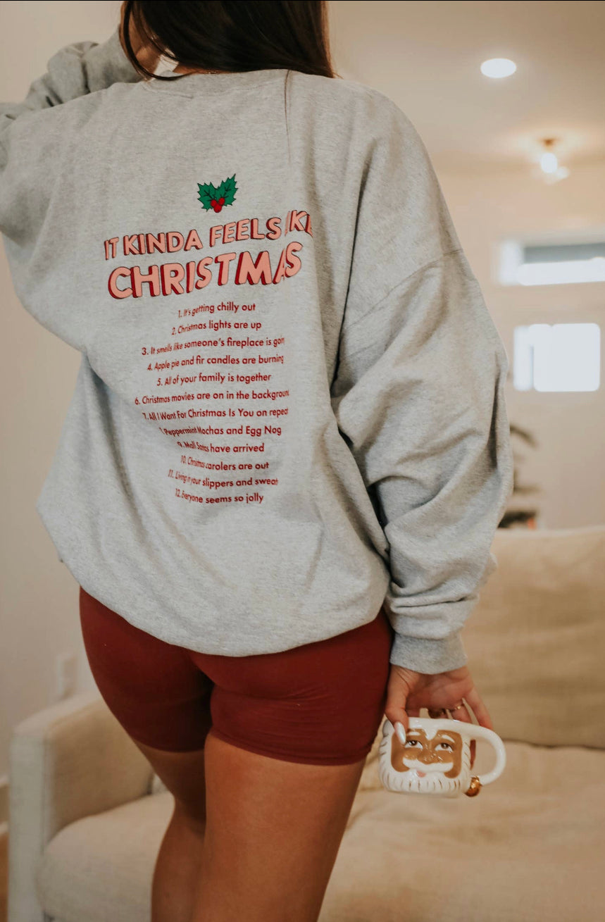 Last one: medium It Kinda Feels Like Christmas (Front + Back)